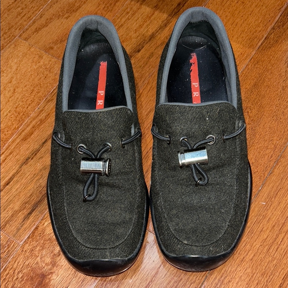 Prada Black Slip-On Loafers with Metal Buckle
